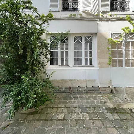 Romantique Petit Duplex Au Coeur Du Marais Apartamento